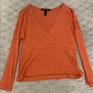 3 quarter sleeve, burnt orange v neck